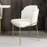 White dining chair upholstered in cotton & linen fabric with elegant gold finish